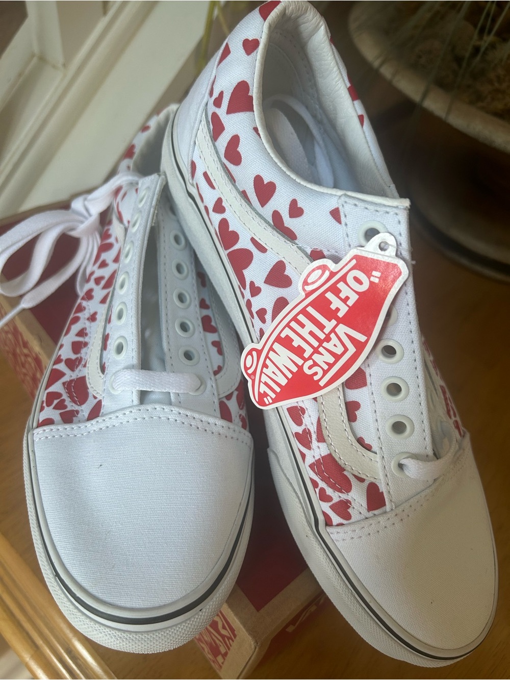 Vans Women's White Slip-On Sneakers with Red Heart Print